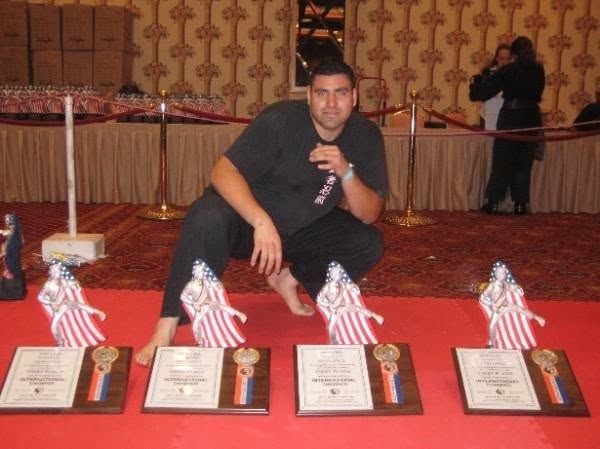 Competitor with award plaques