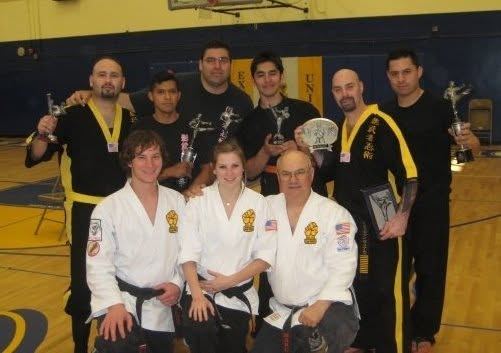 Team at a tournament with trophies