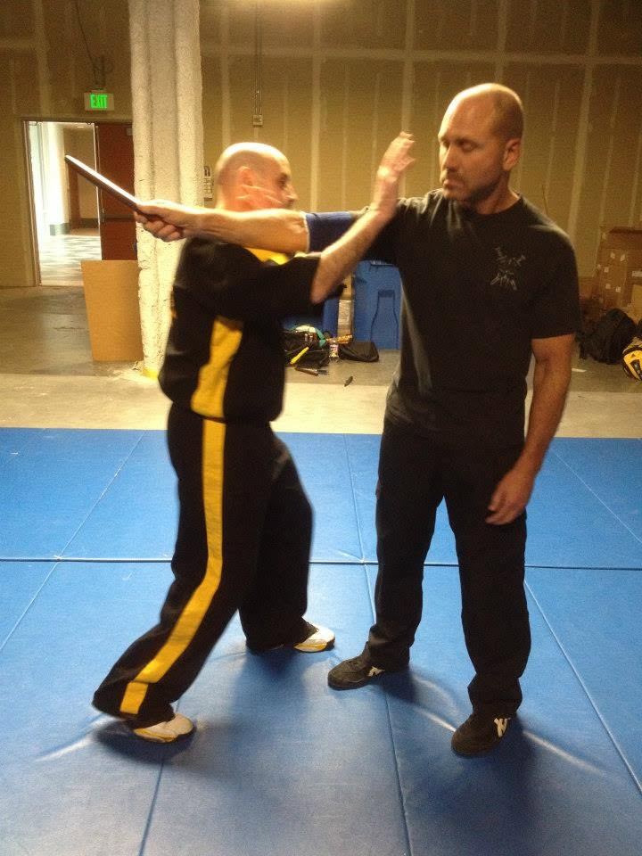 Stick and weapons defense drill