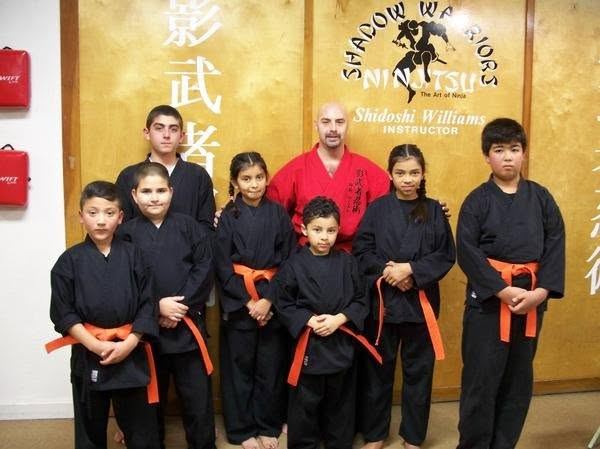 Youth students, orange belts